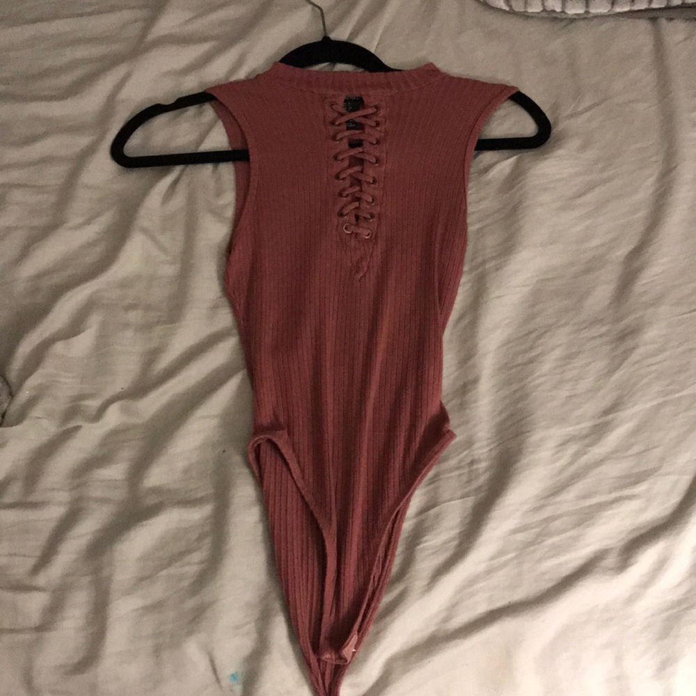 Cute bodysuit with crisscross on the top